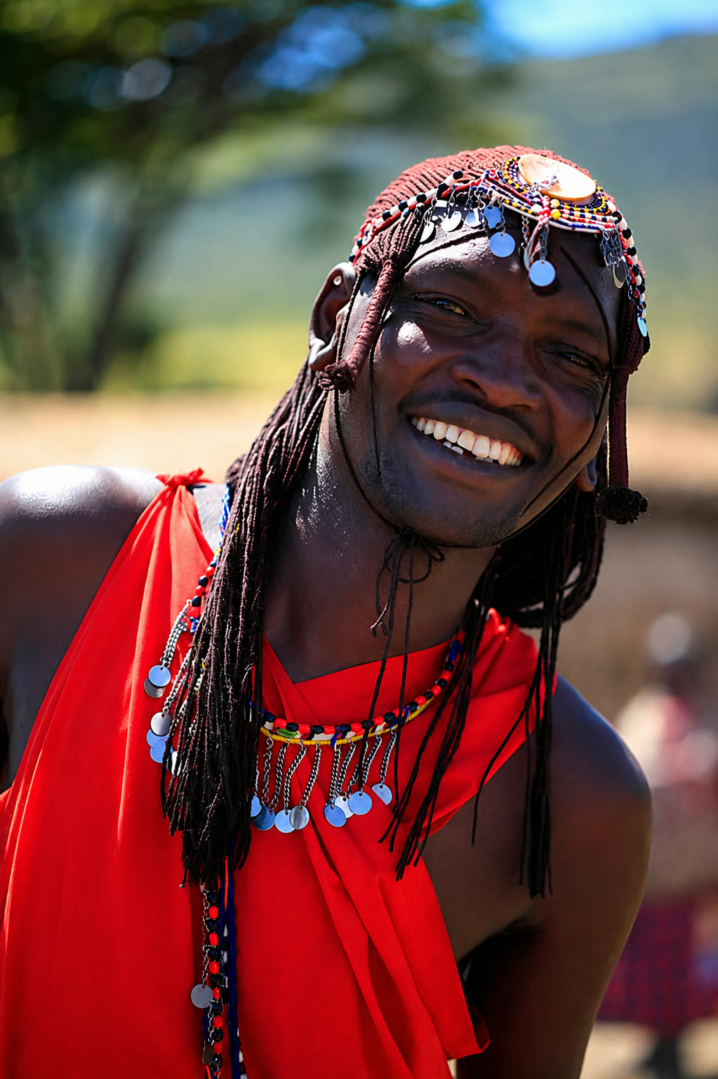 Maasai warrior in traditional dress on the Kenyan plains